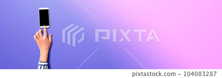 Person using a smartphone Person using a smartphone 104083287
