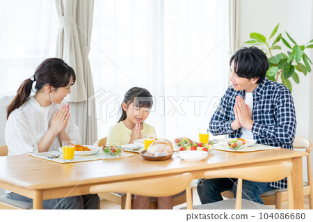 Family dining in the dining room Family dining in the dining room 104086680
