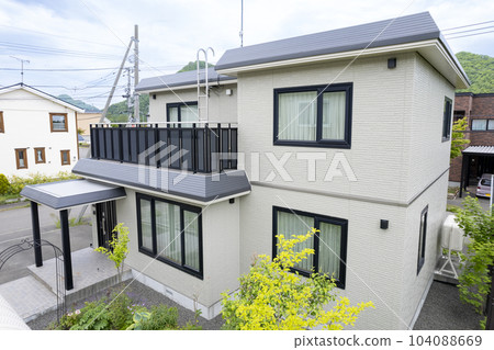 Aerial view of the house after renovation (before and after house renovation) 104088669