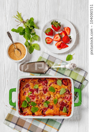 strawberry cobbler, summer dessert in baking dish 104090551