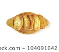Several slices of garlic bread were placed on a wooden plate. 104091642