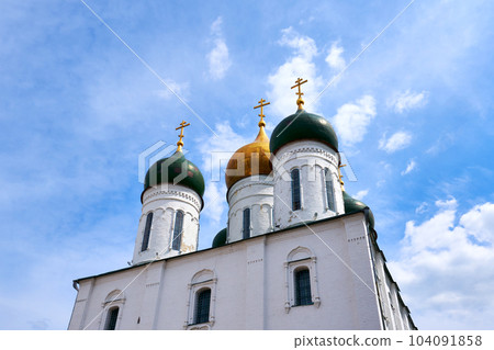Old Russian Christian Cathedral against the blue sky with white clouds Old Russian Christian Cathedral against the blue sky with white clouds 104091858