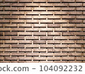 The brick wall has light from on top.Brown brick wall with copy space.  104092232