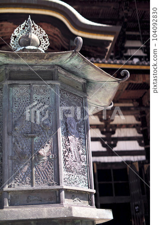 Todaiji Temple: The Great Buddha Hall (Kondo) can be seen through the octagonal lantern Todaiji Temple: The Great Buddha Hall (Kondo) can be seen through the octagonal lantern 104092830