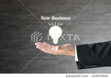 Businessman's hand with a new business idea Businessman's hand with a new business idea 104093685