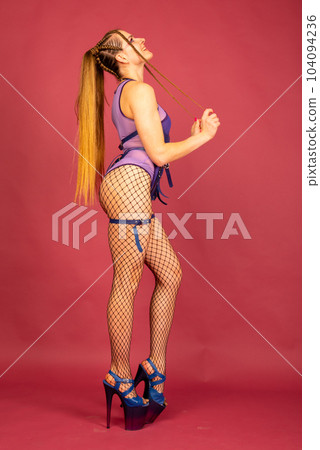 Dancing for adults. Image of sexy pole dancer Dancing for adults. Image of sexy pole dancer 104094236