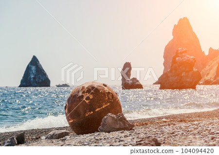 Old rusty sea mine on the beach. Old rusty sea mine on the beach. 104094420