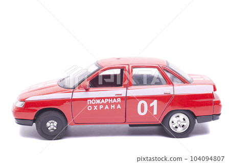 Fire car toy isolated on white background English translation: fire protection (inscription in Russian). 104094807