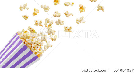 Popcorn flying out of purple white striped paper box, isolated on white background 104094857