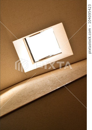 Sunlight coming through the skylight Sunlight coming through the skylight 104095423