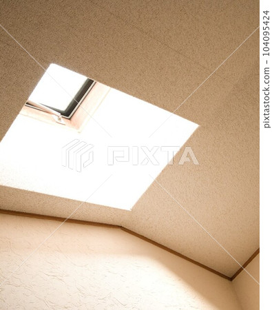 Sunlight coming through the skylight Sunlight coming through the skylight 104095424
