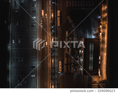 Top view of car traffic transport on crossing multiple lanes highway or expressway in Asia city at night. Civil engineering, technology background, Asian transportation concept 104096023
