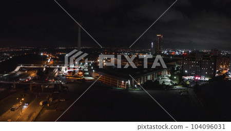 Aerial view of the Istambul business district. Rapidly developing business and finance area of Istanbul with highrises and shopping malls. Commercial buildings at night 104096031