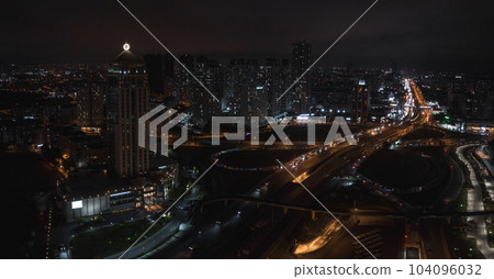 Aerial view of the Istambul business district. Rapidly developing business and finance area of Istanbul with highrises and shopping malls. Commercial buildings at night 104096032