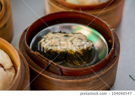 dim sum in bamboo steamer, chinese cuisine dim sum in bamboo steamer, chinese cuisine 104098547