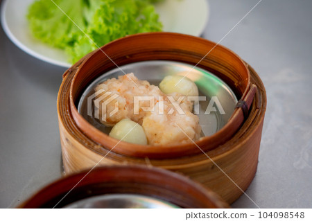 dim sum in bamboo steamer, chinese cuisine dim sum in bamboo steamer, chinese cuisine 104098548