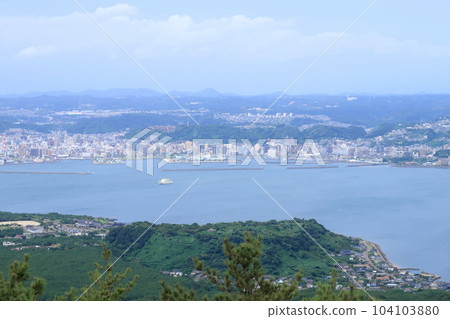 Scenery of Sakurajima in cloudy sky and Sakurajima Ferry 104103880