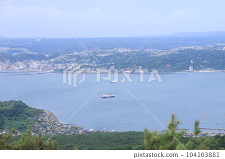 Scenery of Sakurajima in cloudy sky and Sakurajima Ferry 104103881