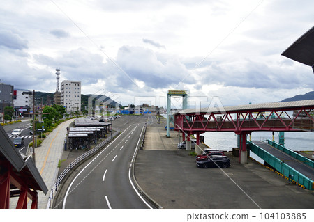 Scenery of Sakurajima in cloudy sky and Sakurajima Ferry 104103885