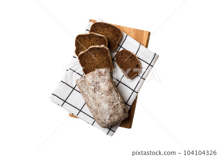 Freshly baked bread slices on cutting board isolated on white background . top view Sliced bread Freshly baked bread slices on cutting board isolated on white background . top view Sliced bread 104104326