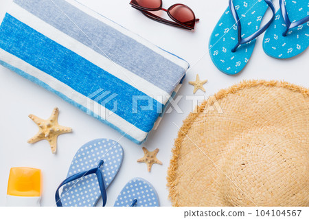 Summer vacation concept flat lay. beach accessories and towel top view. Space for text. travel concept 104104567