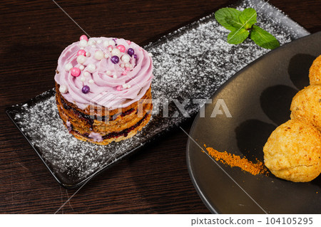Beautifully decorated first course and dessert on Beautifully decorated first course and dessert on 104105295