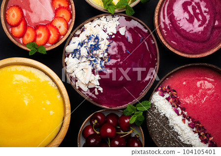 Different colorful smoothies 104105401