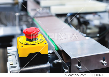 Big red emergency stop button for production equipment in production. 104106050