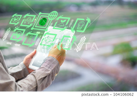 person use software to save energy,and reduce global warming,climate change,ecology friendly investment,ESG environment social governance,Green Business Innovation and Sustainable Development concept. 104106062