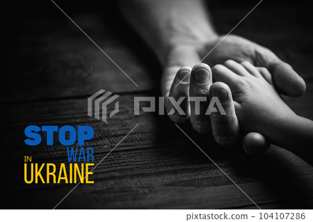 male hand hold children hand 104107286