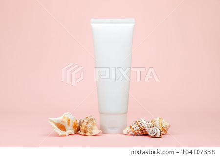 cosmetic cream tube, sea shells on pink background. mockup, skincare product blank plastic package. lotion, balsam, toothpaste, lubricant, cleanser, moisturizer. white bottle 104107338