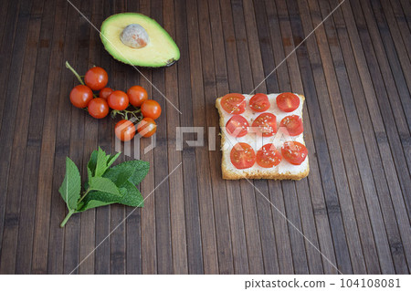 Healthy breakfast toast with tomatoes, ricotta and herbs Healthy breakfast toast with tomatoes, ricotta and herbs 104108081