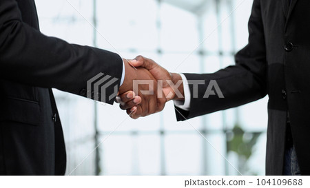 meeting of two companions in the office. 104109688