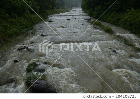 Hakushu-cho, Hokuto City, Ojira River swollen due to heavy rain Hakushu-cho, Hokuto City, Ojira River swollen due to heavy rain 104109723