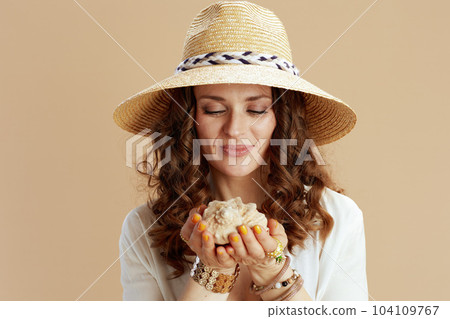 happy woman in blouse and shorts isolated on beige happy woman in blouse and shorts isolated on beige 104109767