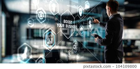Boost Your Business 2023. Businessman touching finger virtual screen 104109800