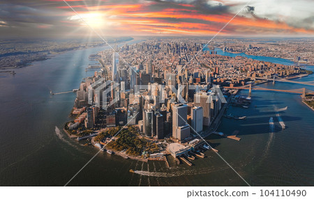 Beautiful sunset over Manhattan island in New York city. Aerial New York view from above. Beautiful sunset over Manhattan island in New York city. Aerial New York view from above. 104110490