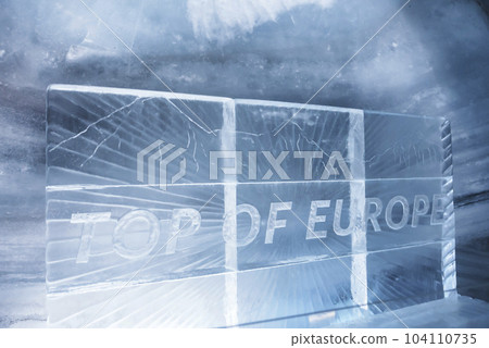 Interior of Jungfrau ice palace with top of europe text on frame in glacier tunnel at Switzerland, winter holiday travel concept 104110735