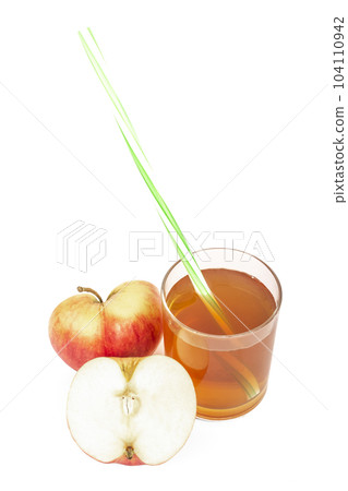 red apple cut apple juice in glass and fresh apples on a white background red apple cut apple juice in glass and fresh apples on a white background 104110942