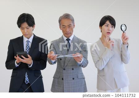 Strike a calculator _ measure with a tape measure _ see with a magnifying glass _ 3 business people doing different jobs _ 1 104111732