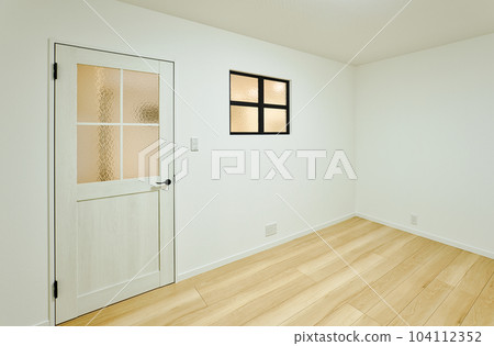 Residential image Newly built house White-walled room with deco windows 104112352