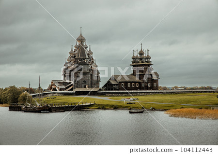 Russia. Kizhi Island on Lake Onega. Wooden domes of the architectural ensemble Kizhi Pogost Russia. Kizhi Island on Lake Onega. Wooden domes of the architectural ensemble Kizhi Pogost 104112443