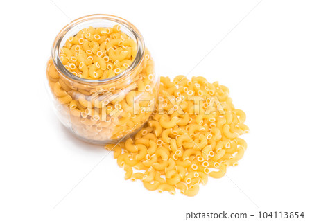 Uncooked Chifferi Rigati Pasta in Glass Jar Isolated on White 104113854