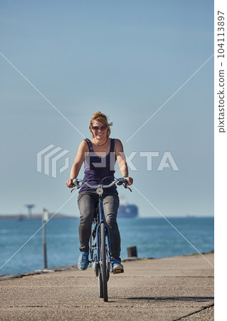 Cycling along Dutch shores 104113897