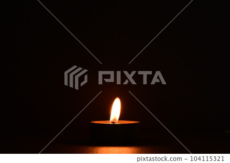 flame lit candle flame lit candle 104115321