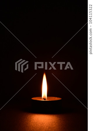 flame lit candle flame lit candle 104115322