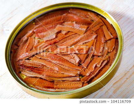 Salted anchovy fillets in oil, traditional spanish canned food 104116709