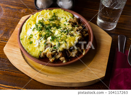 Soft boiled meat stewed with mung, vegetables and spices Soft boiled meat stewed with mung, vegetables and spices 104117263