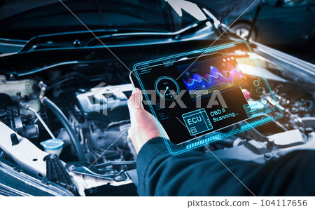 Auto mechanic checking ECU engine system with OBD2 wireless scanning tool Auto mechanic checking ECU engine system with OBD2 wireless scanning tool 104117656