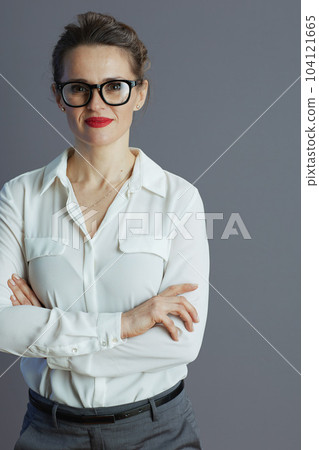 stylish 40 years old business woman isolated on grey stylish 40 years old business woman isolated on grey 104121665